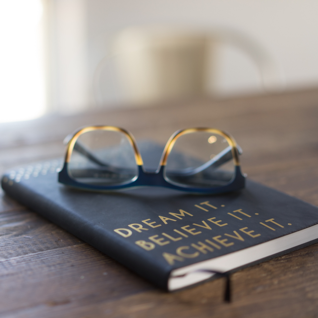 Glasses and book for planning